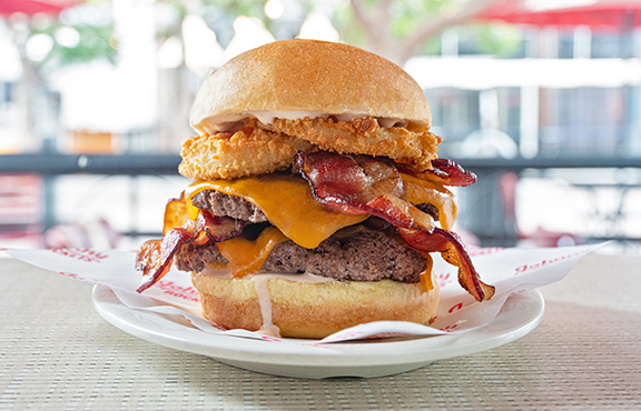 https://www.johnnyrockets.com/wp-content/uploads/sites/3/2023/11/229JRC_576x370_Smoke-House-Double.jpg